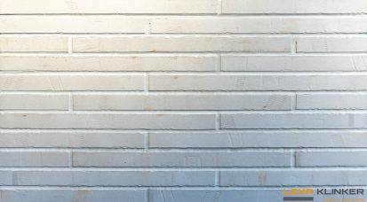 Фасадная клинкерная плитка Piccolo длинного формата в белых и кремово‑серых оттенках